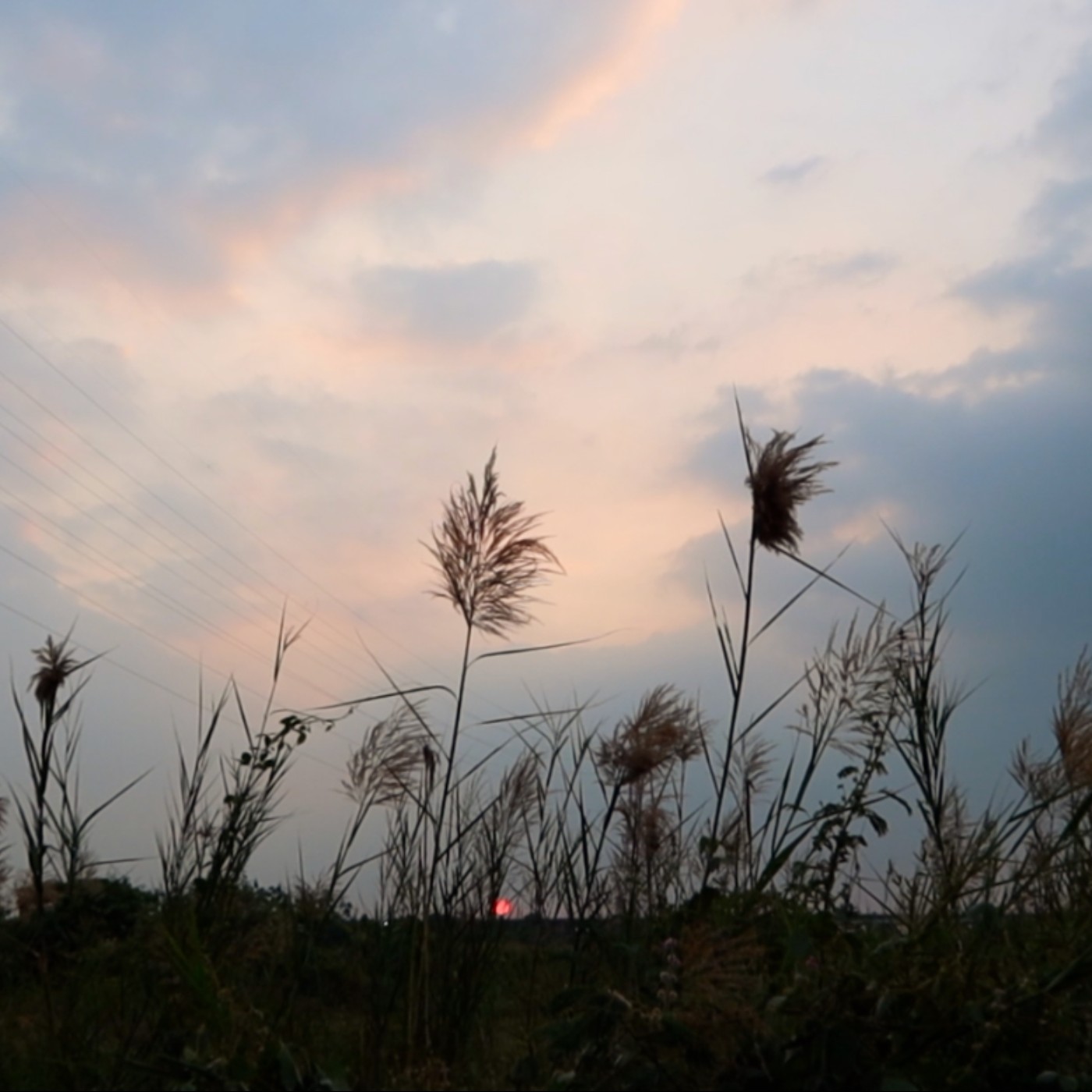 CloudySunset riverside